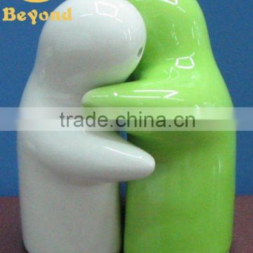 ceramic cruet set green and white hugging salt and pepper shaker