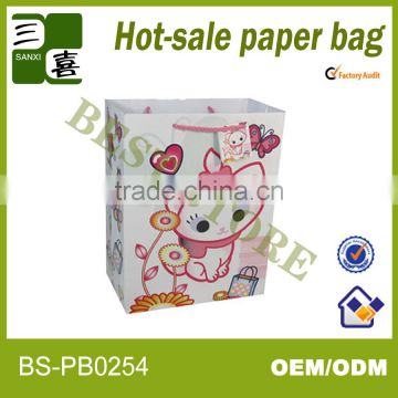 small and beautiful paper gift bag with ribbon