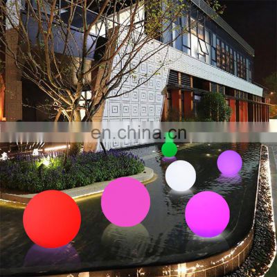 Waterproof remote control wireless glow illuminated outdoor solar plastic led ball sphere stone light lamp