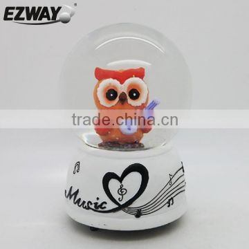 Cute resin owl figurine snow globe