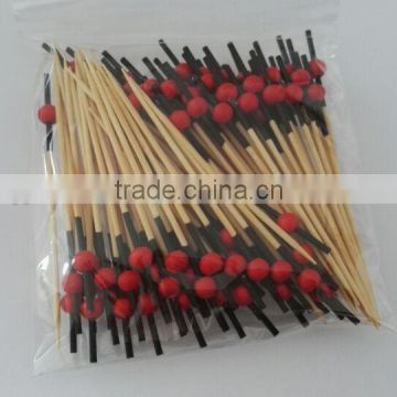 Cocktail sticks skewer with red bead