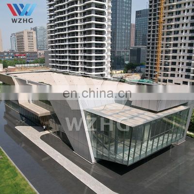 Q235B Fire And Earthquake Resistance  Lake Red Beauty  Sandwich Panel Prefab Steel Structure Prefabricated Warehouse