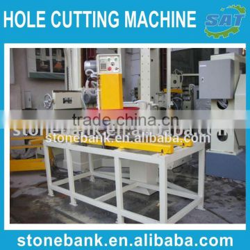 Hole cutting machine