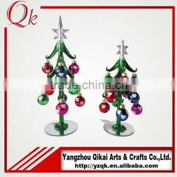 Handmade glass christmas tree with colorful ornament
