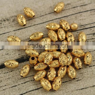 JS1228 Wholesale gold carved flower stardust rice beads,stardust drum spacer beads