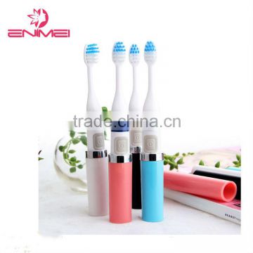 Adult electric toothbrush with brush head holder