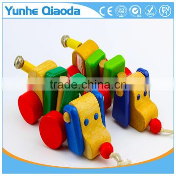 colorful Pull Along wiggles Dog Wooden Toy wiggles as you pull they make a clicking sound and make a fun baby