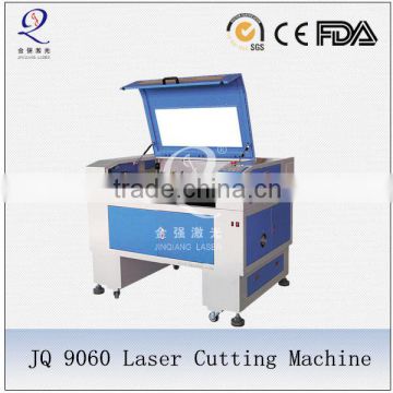 2016 hot Good price Jinan JQ leather glove cutting by jq co2 laser cutting machine