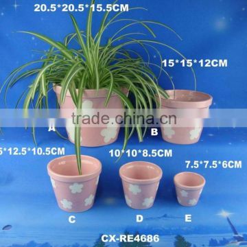 Pink round ceramic flower pot and planter