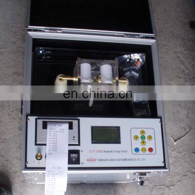 Dielectric strength tester, transformer oil tester device