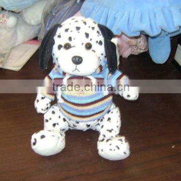 plush dog with knitted clothing