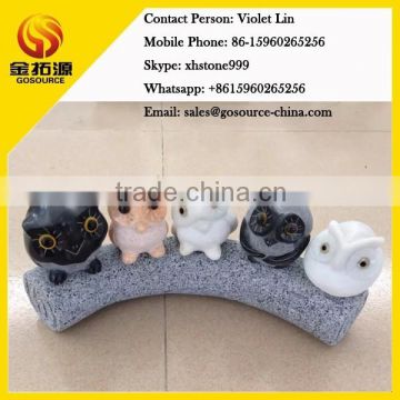 marble owl statues family