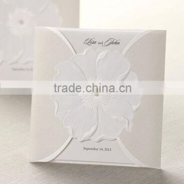 Pure & elegant white wedding invitations with floral embossed pattern