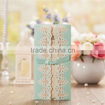 Elegant & charming blue laser cut wedding invitations with ribbons                        
                                                Quality Choice