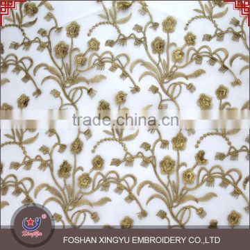 East fashion organza water soluble lace embroidery fabric on chiffon with gold thread for dress