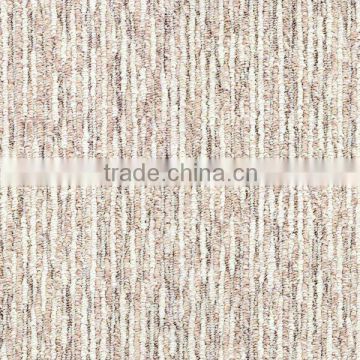 Textured patterned loop pile carpet