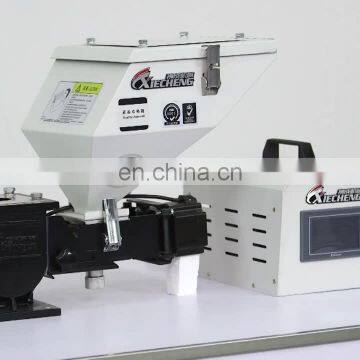 Two color plastic volumetric doser for doser machine