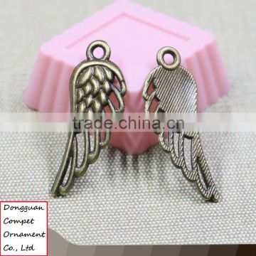 Wholesale zinc alloy hot hollow out snitch wings pendant