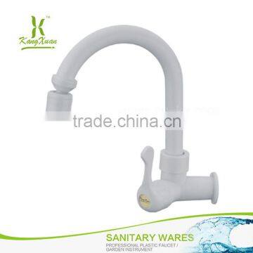 white plastic kitchen water faucet