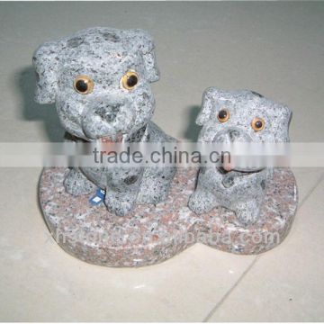 Couple grey stone carved dog statue