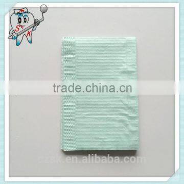 light green disposable dental patient bibs