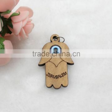 Fatima wooden pendant with blue eye