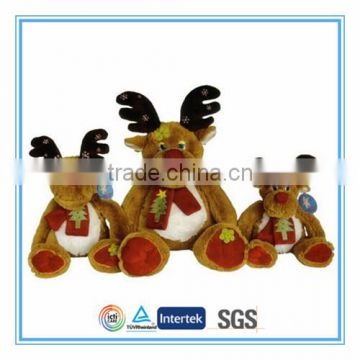 plush toy reindeers with red scarf