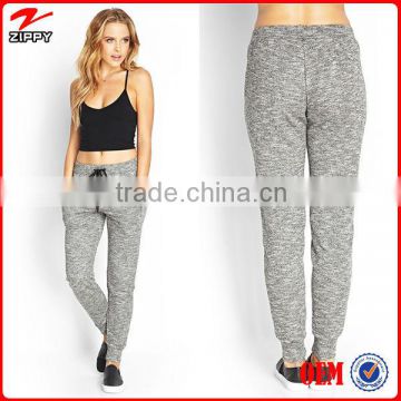 Easy fit women wholesale sports clothing/Side slit pockets knitted ladies jogger pants