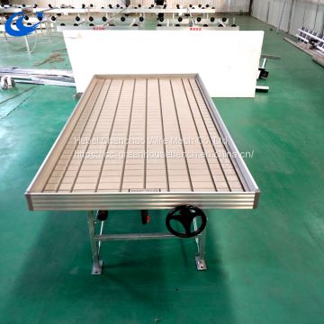 Plastic greenhouse benches ebb and flow metal rolling table