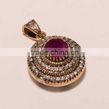 P0046-STERLING SILVER IMITATION RUBY AND CZ PENDANT 10.73