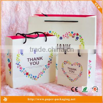 White color cardboard paper bag with different handle types