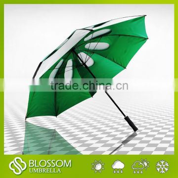 Double golf umbrella for advertising in green