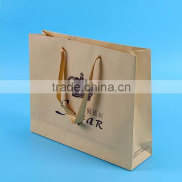 shopping paper bag with ribbon handles