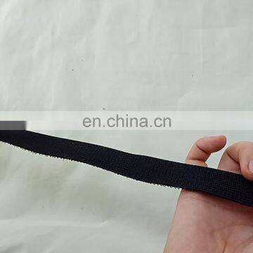 Elastic hook and loop strap with plastic buckle