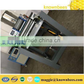 Automatic beewax embossing machine