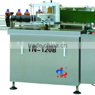 Self-adhesive round bottle labeling machine