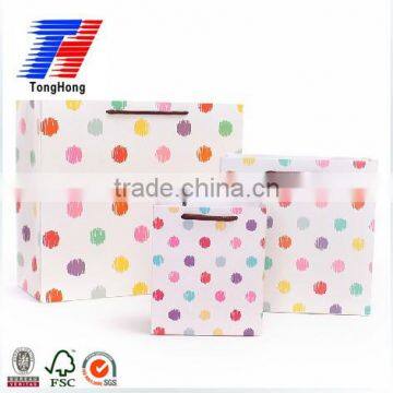 Very popular shopping paper bag with dot and handle and various size