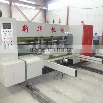 High speed four color printer slotter die-cutter
