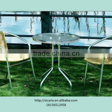 ALUMINUM SET WITH A GLASS TABLE AND TWO RATTAN CHAIRS