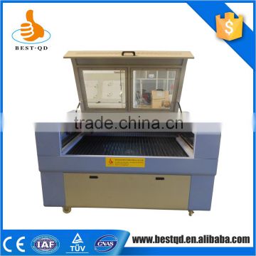 Alibaba China 50w co2 laser non-woven cloth cutting and engraving machine