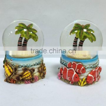 water filled glass globe with detailed colourful resin figurine 65mm