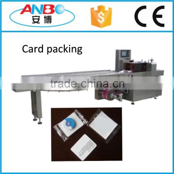 Automatic card wrapping machine
