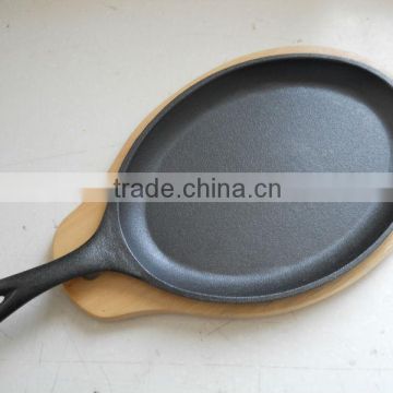 10" by 7" cast iron pre seasoned fajita pan with underliner base