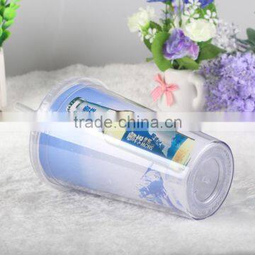 Double wall 16 oz plastic tumbler with paper insert for beverage