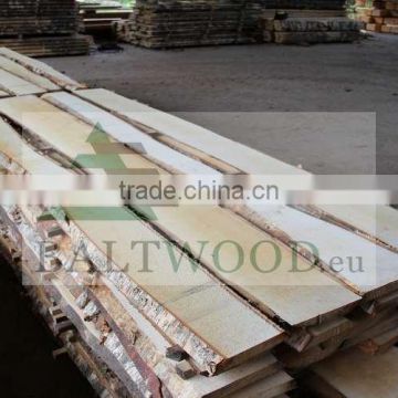 Unedged birch timber