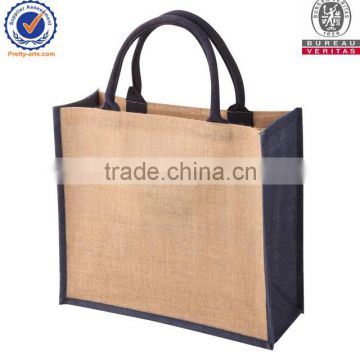 Jute shopping bag of dark blue side and tight round handle