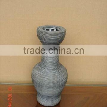 Plastic rattan flower vase with wooden linner.