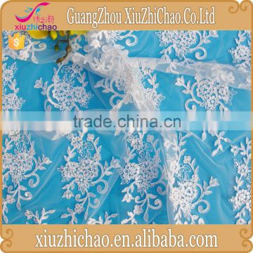 ZP0011-M (11.2)New pattern embroidered designs lace product mesh polyester ivory guipure lace fabric with sequins