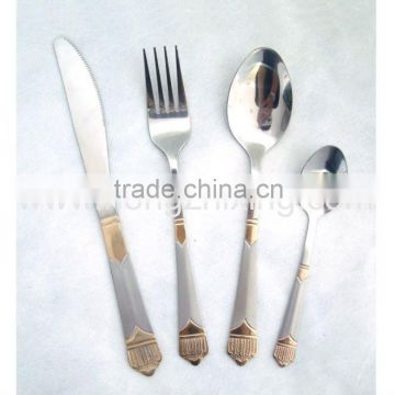Stainless steel flatware set with crown pattern