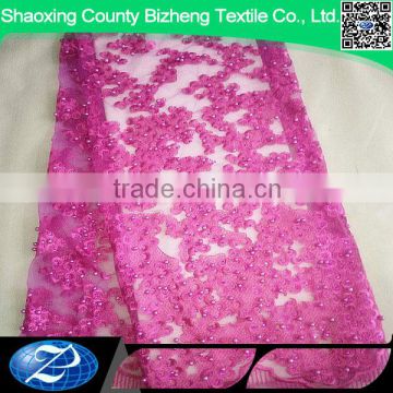 pink color net lace fabric beaded french lace fabric